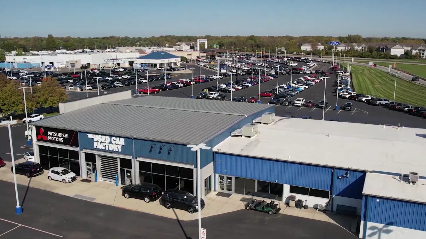 Aerial view of the Ricart Used Car Factory complex and inventory lot
